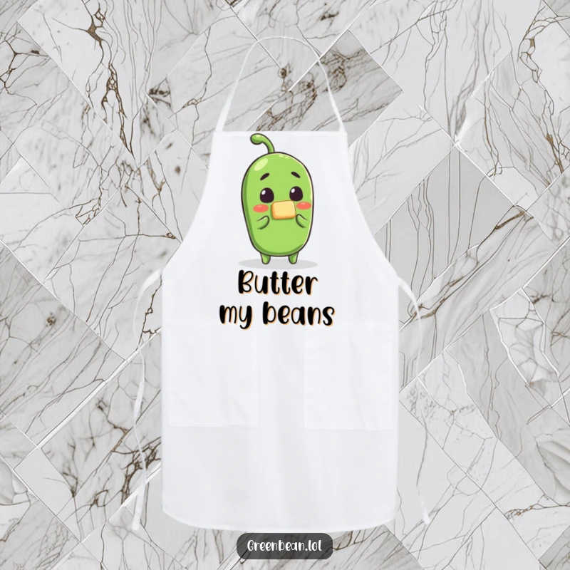 Funny green bean butter apron, a surprised bean character as butter is applied, practical and humorous kitchen attire for cooking fun.