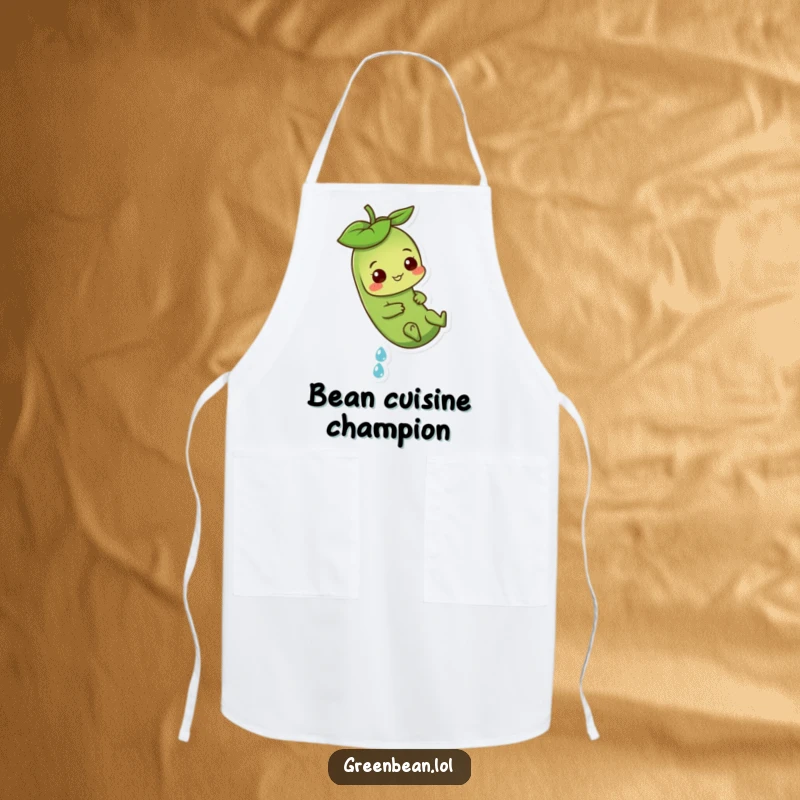 Funny Green Bean Apron featuring a playful character sliding down a dewdrop, perfect for kitchen fun and lighthearted cooking.