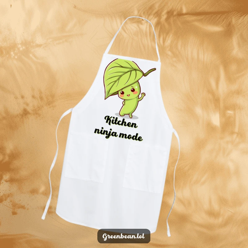 Funny green bean apron featuring a mischievous character playing hide-and-seek behind a leaf, perfect for playful cooking.