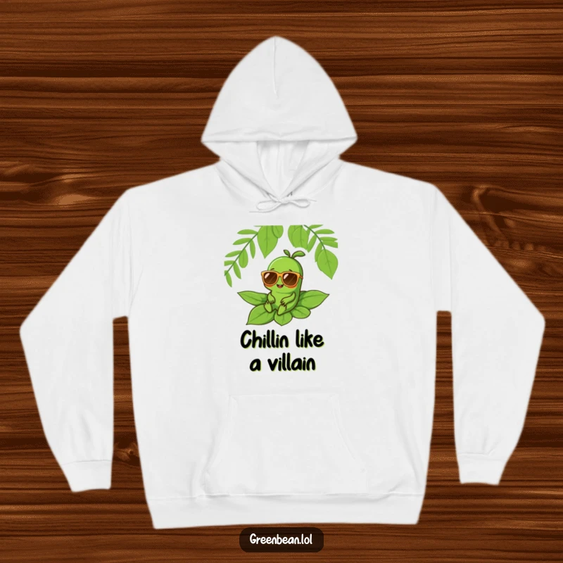 Funny hoodie featuring a green bean character in oversized sunglasses, relaxing on a leaf, perfect for cozy, cool days.