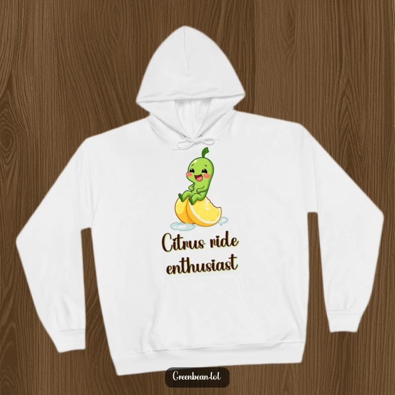 Funny hoodie illustration of a green bean character giggling while sliding down a slippery lemon wedge.