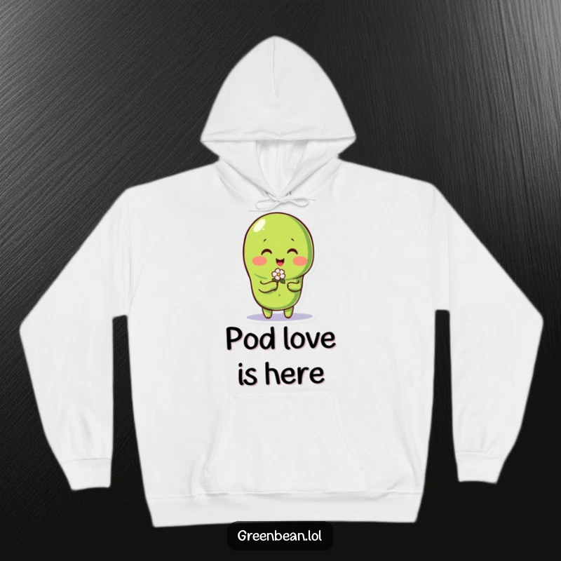 Funny green bean character offering a tiny flower in a heartwarming gesture, featured on a soft, cozy hoodie.