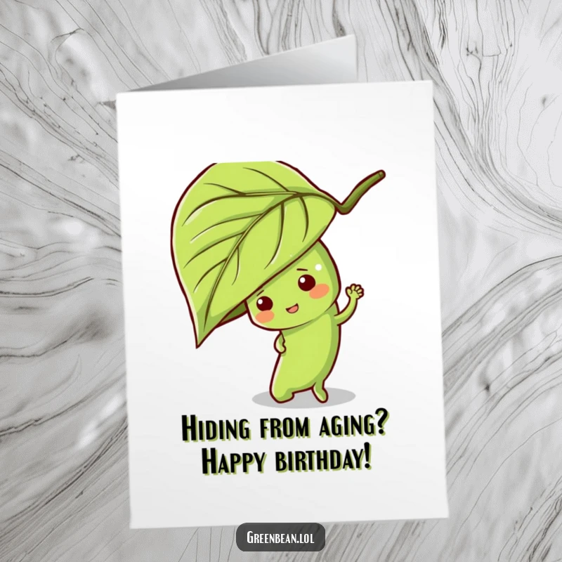 Funny Free Printable Birthday Card: A mischievous green bean character peeking playfully from behind a large green leaf.