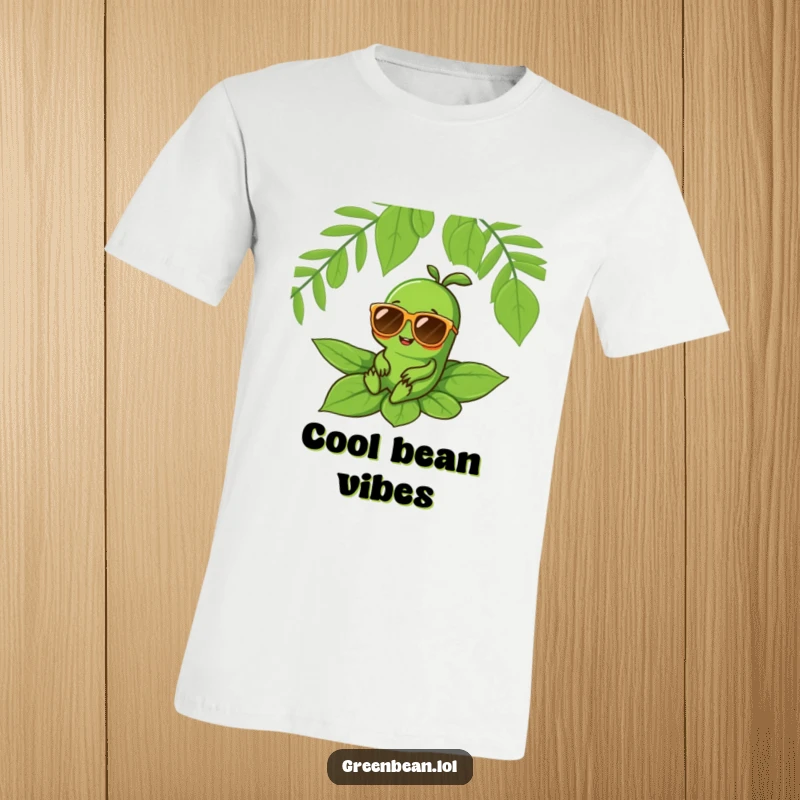 Funny t-shirt showing a cheerful green bean character with oversized sunglasses relaxing on a leaf, radiating cool confidence.