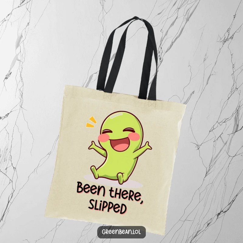 Funny tote bag illustrating a green bean character in a comical slip, ready to carry your belongings with a side of humor.